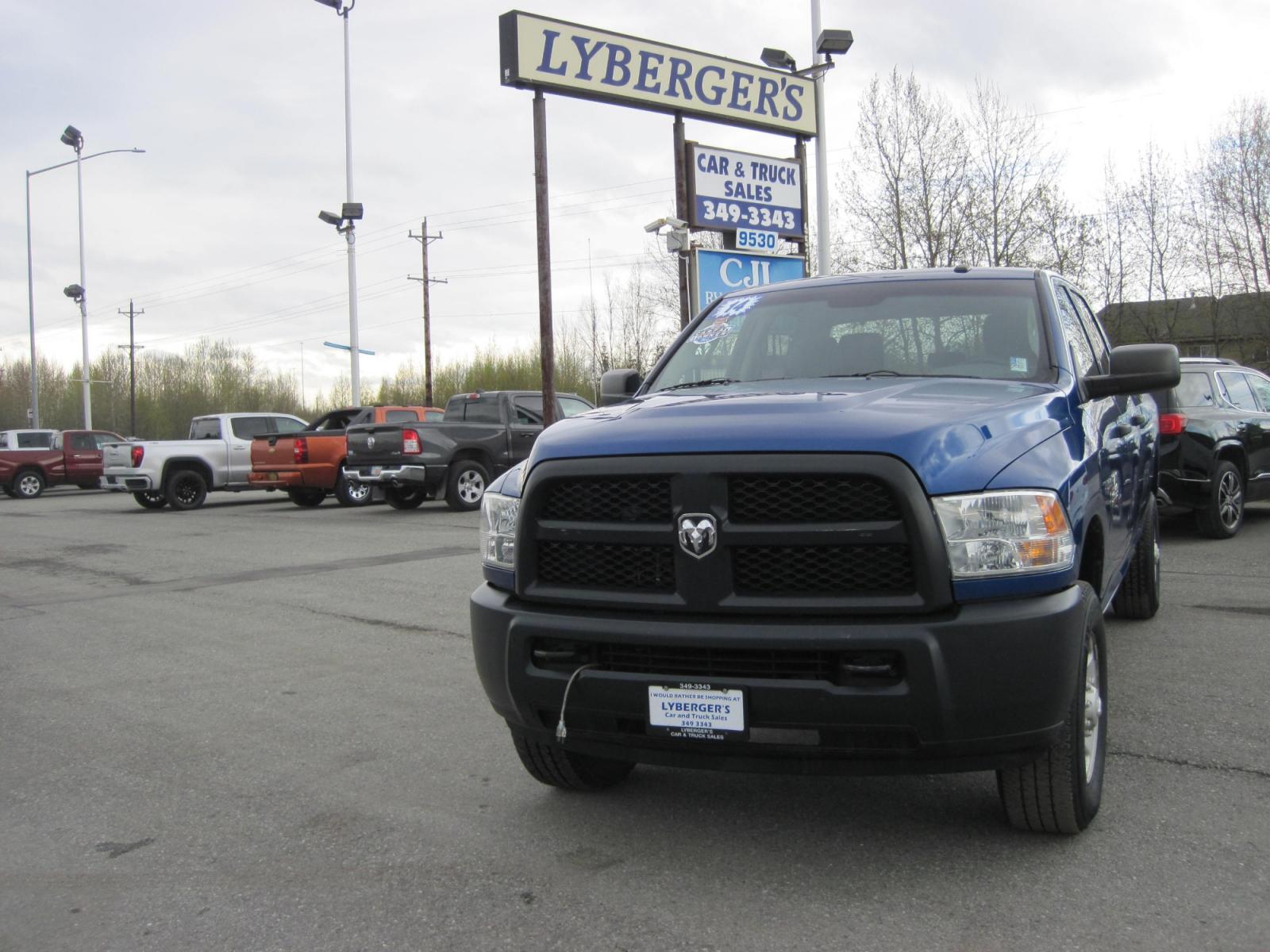 2014 blue /gray RAM 2500 Tradesman Crew Cab 4WD (3C6TR5HT1EG) with an 5.7L V8 OHV 16V engine, automatic transmission, located at 9530 Old Seward Highway, Anchorage, AK, 99515, (907) 349-3343, 61.134140, -149.865570 - Low miles on the Ram 2500 come take a test drive - Photo #2